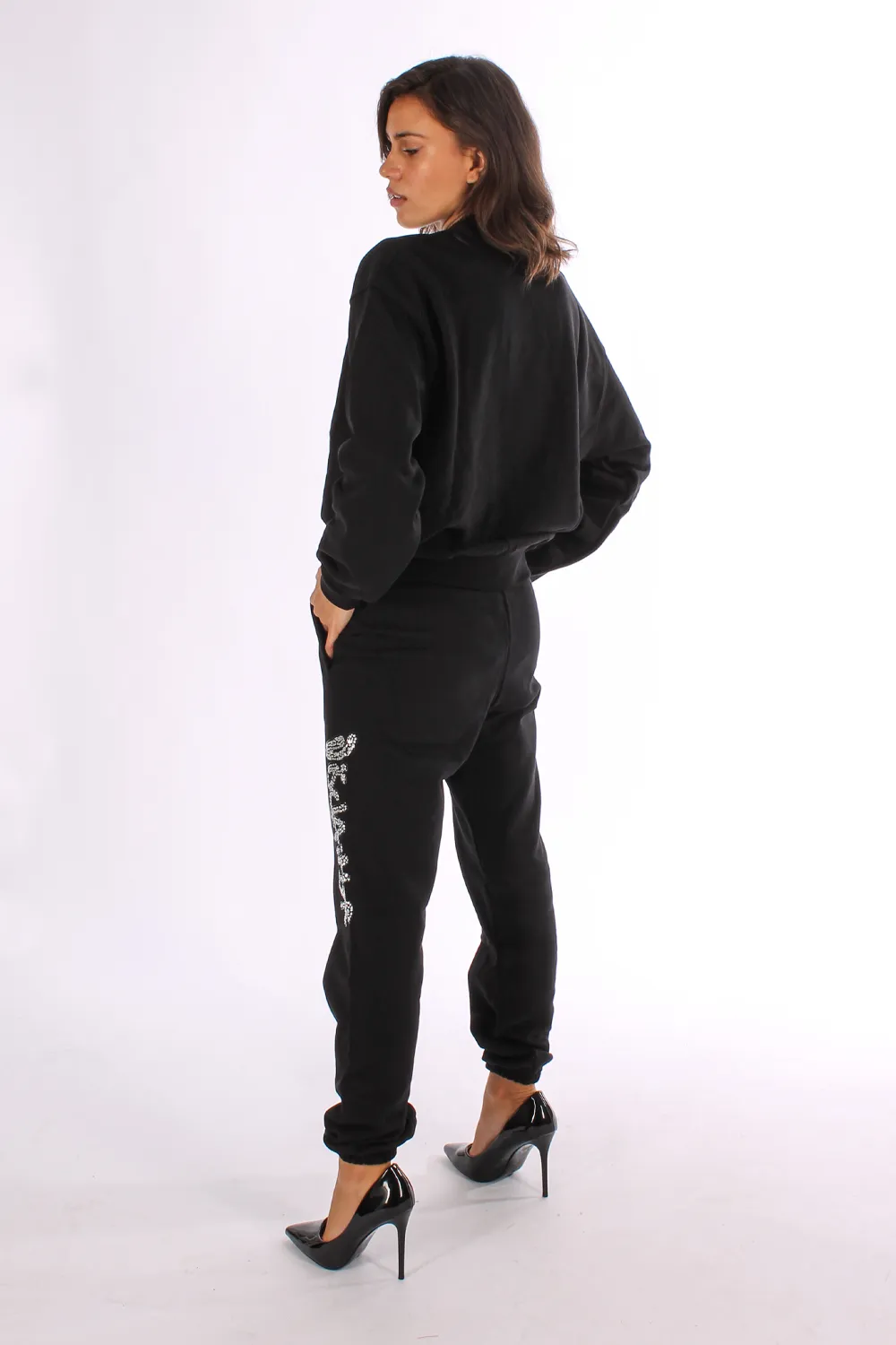 DISCLAIMER | PANTALONI CON MAXI LOGO STRASS - Punto Blu