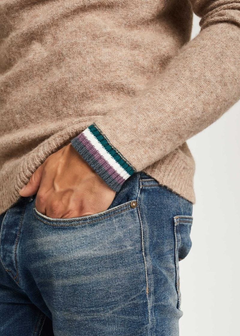 Maglione con bordi a righe