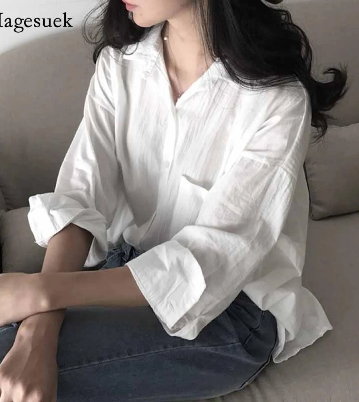 New Chic Casual Protezione solare Top Donna Autunno Stile Hong Kong Risvolto allentato Tinta unita Nona manica Camicia di media