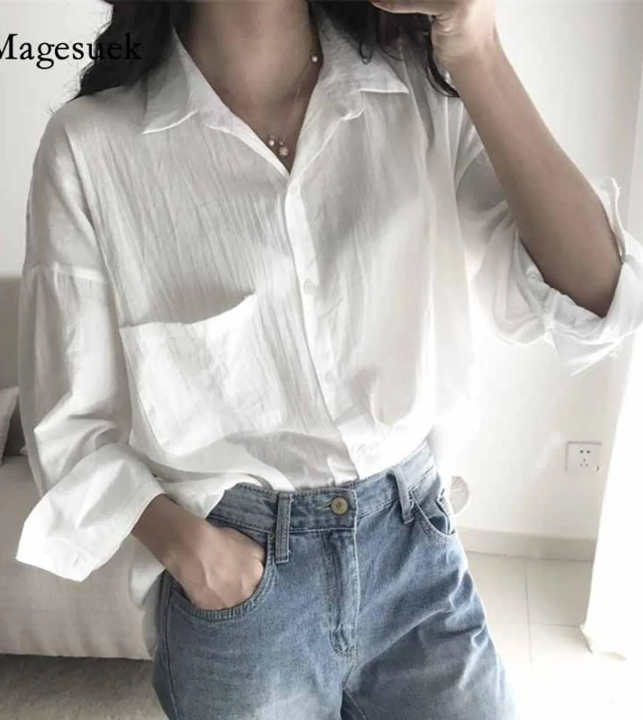 New Chic Casual Protezione solare Top Donna Autunno Stile Hong Kong Risvolto allentato Tinta unita Nona manica Camicia di media