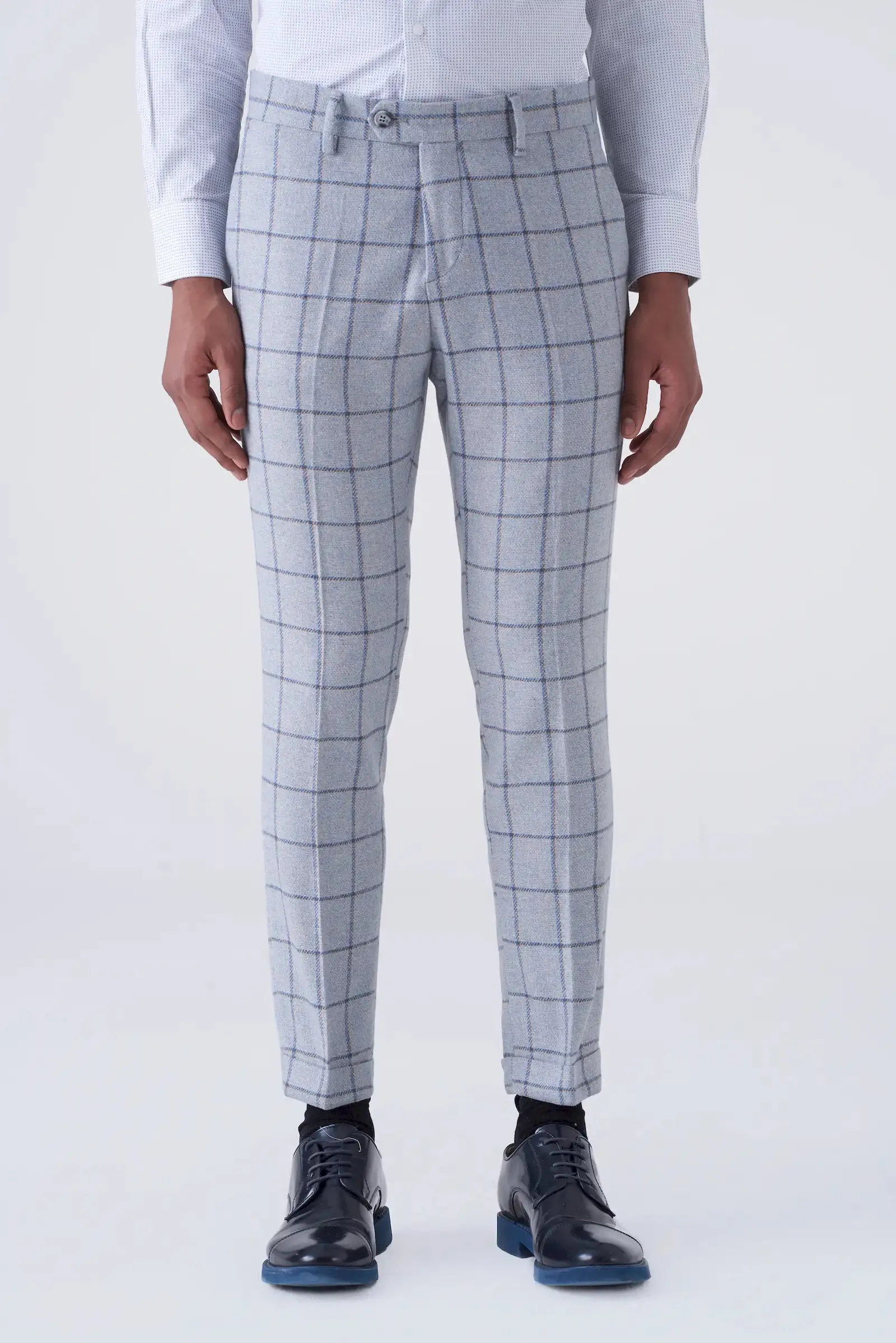 Pantaloni grigio chiaro fantasia a quadri