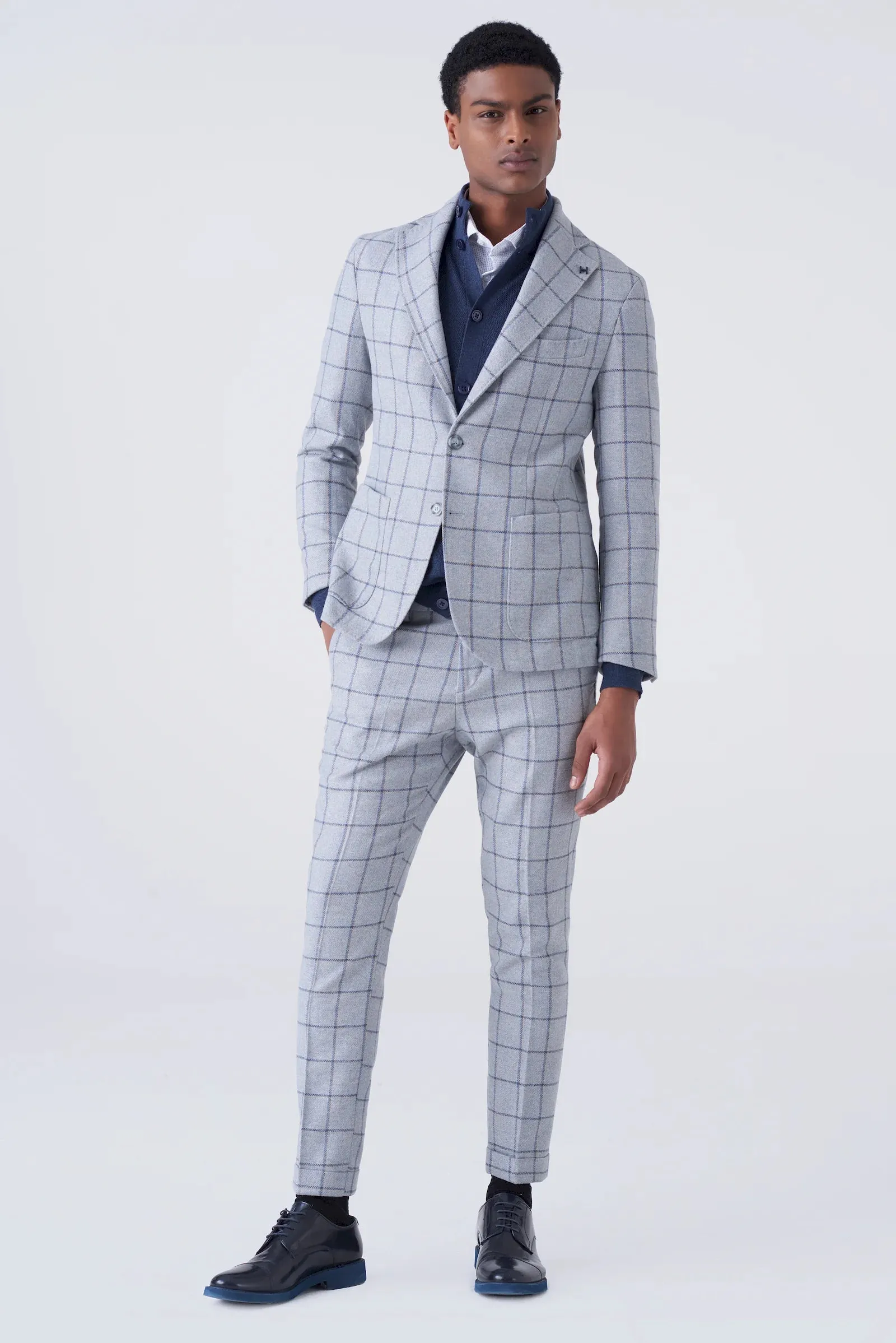 Pantaloni grigio chiaro fantasia a quadri