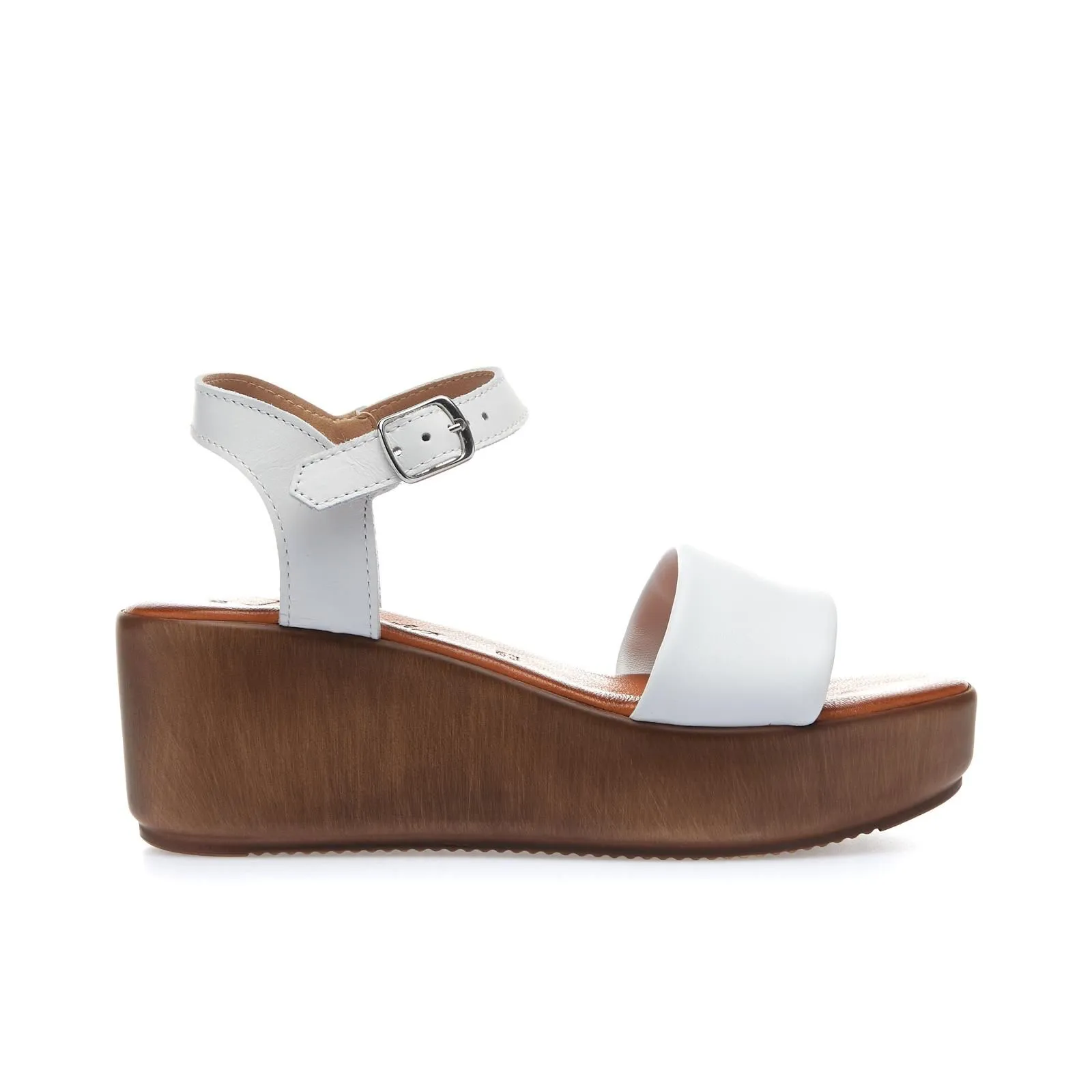 Sandali bianchi con zeppa in pelle
