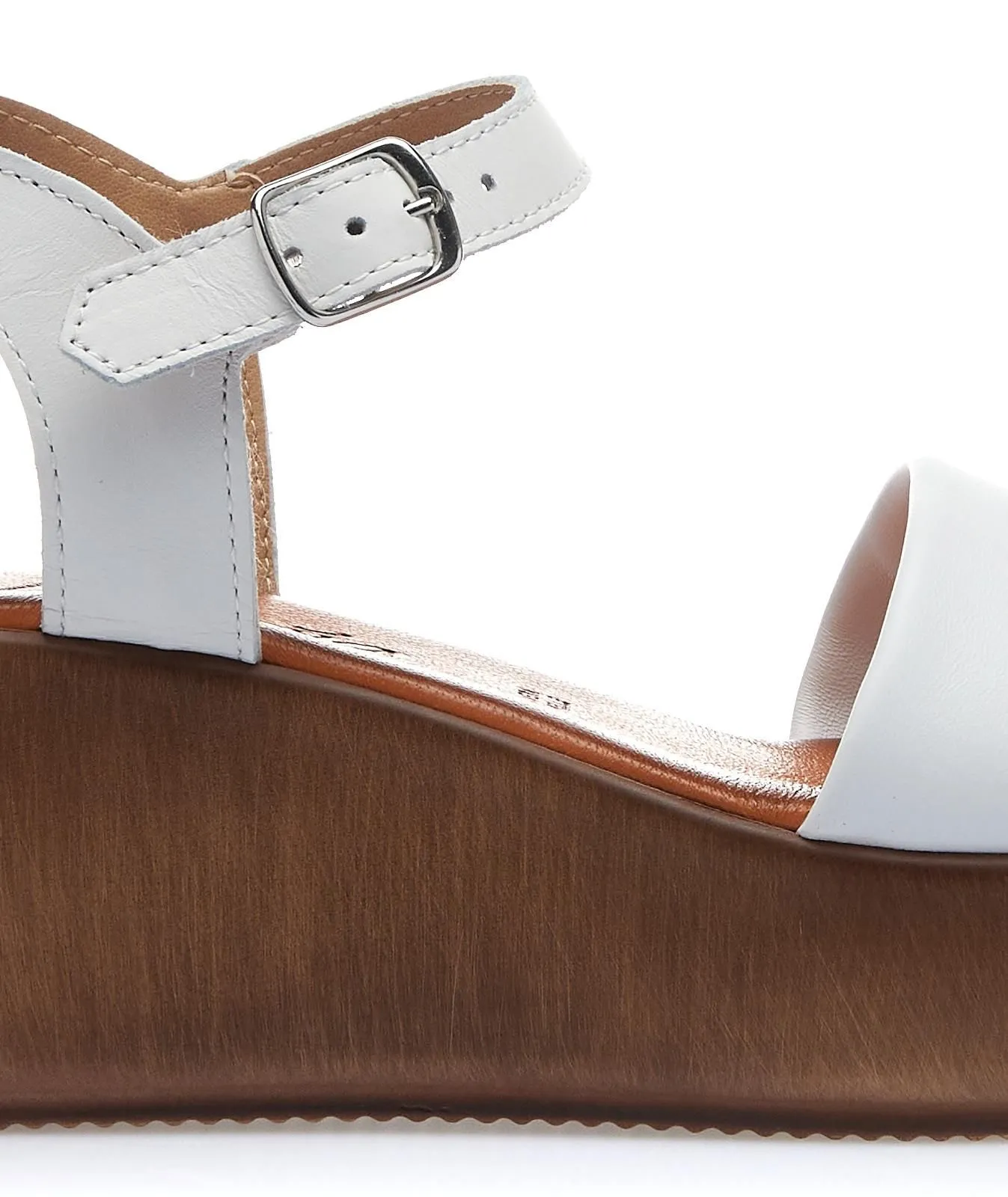Sandali bianchi con zeppa in pelle